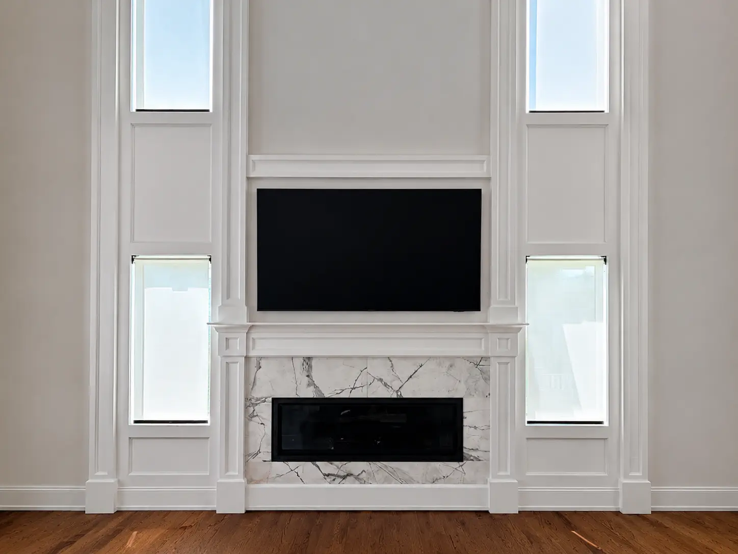 Completed concealed TV and fireplace electrical installation
